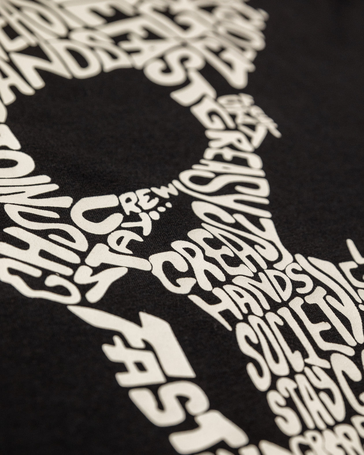 way of life black graphic tee detasil showing the words that make up the skull on the back of the t-shirt