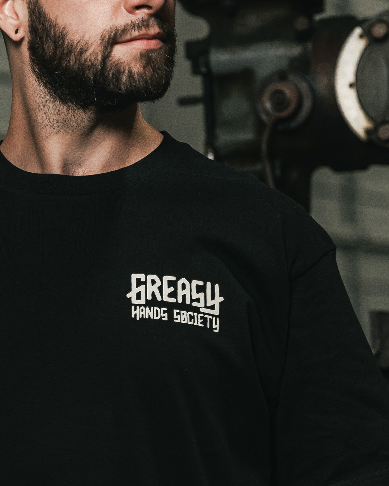 way of life black t-shirt on a model - front view with left chest grasy hands society logo