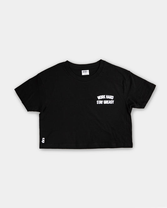 Black crop top t-shirt with white text on a light gray background