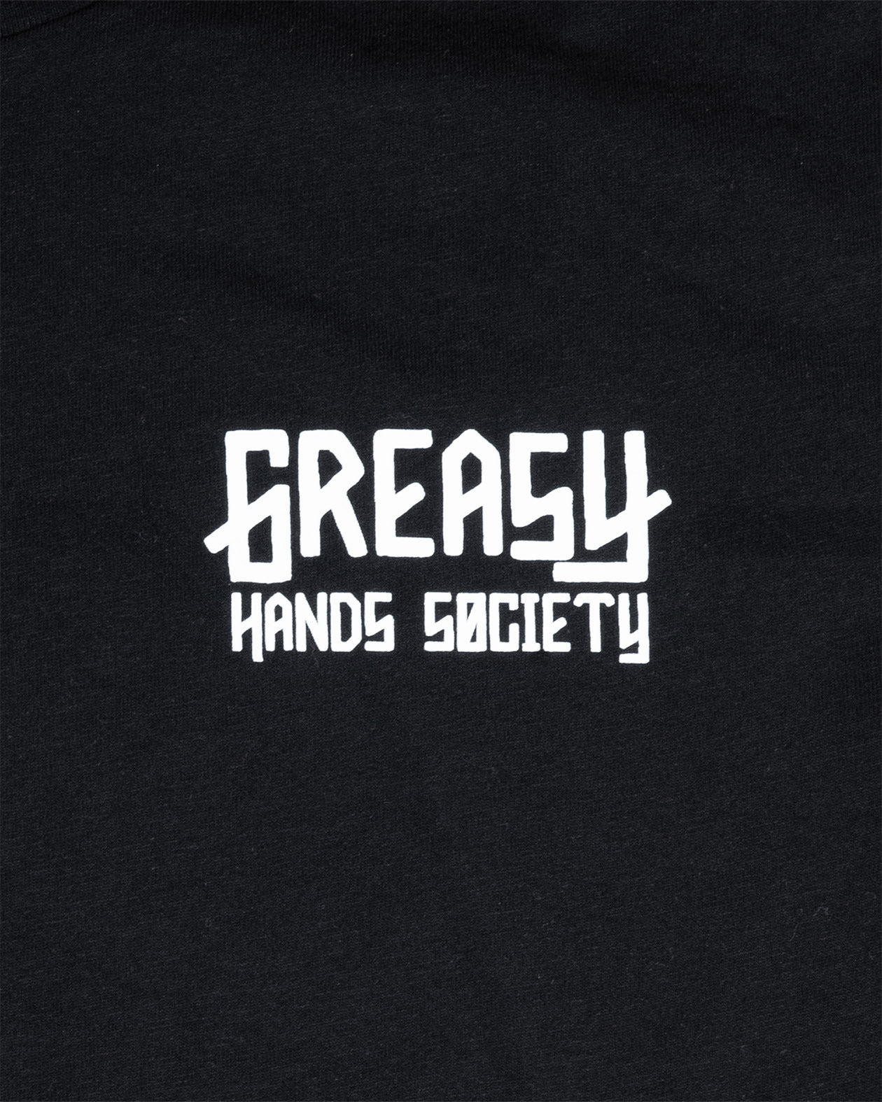 women's Black t-shirt with 'Greasy Hands Society' logo on the left chest text in white on a black background