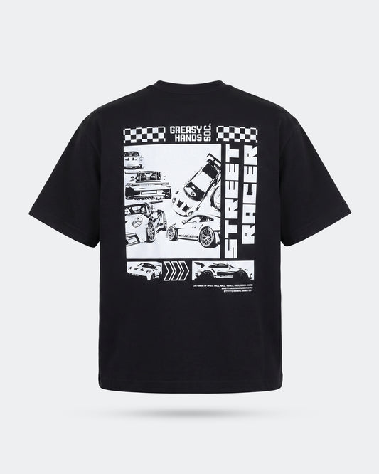 back of a Black t-shirt with white street racer graphic design on a light gray background - Street Racer graphic tee by greasy hands society