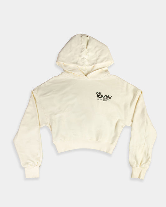 destination women's crop top hoodie - Beige hoodie with a greasy script on a white background