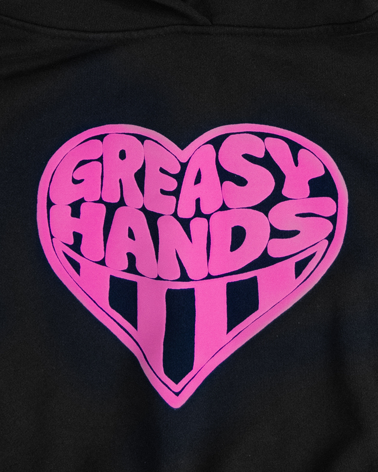 Black hoodie with pink 'Greasy Hands' heart design