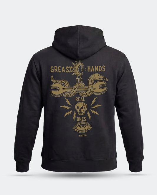 A black pullover hoodie shown from the back, featuring a large gold graphic print with a snake, skull, eye, lightning bolts, and the text 'GREASY HANDS SOCIETY - THE REAL ONES' on a light gray background - Snake Eye Hoodie by Greasy Hands Society