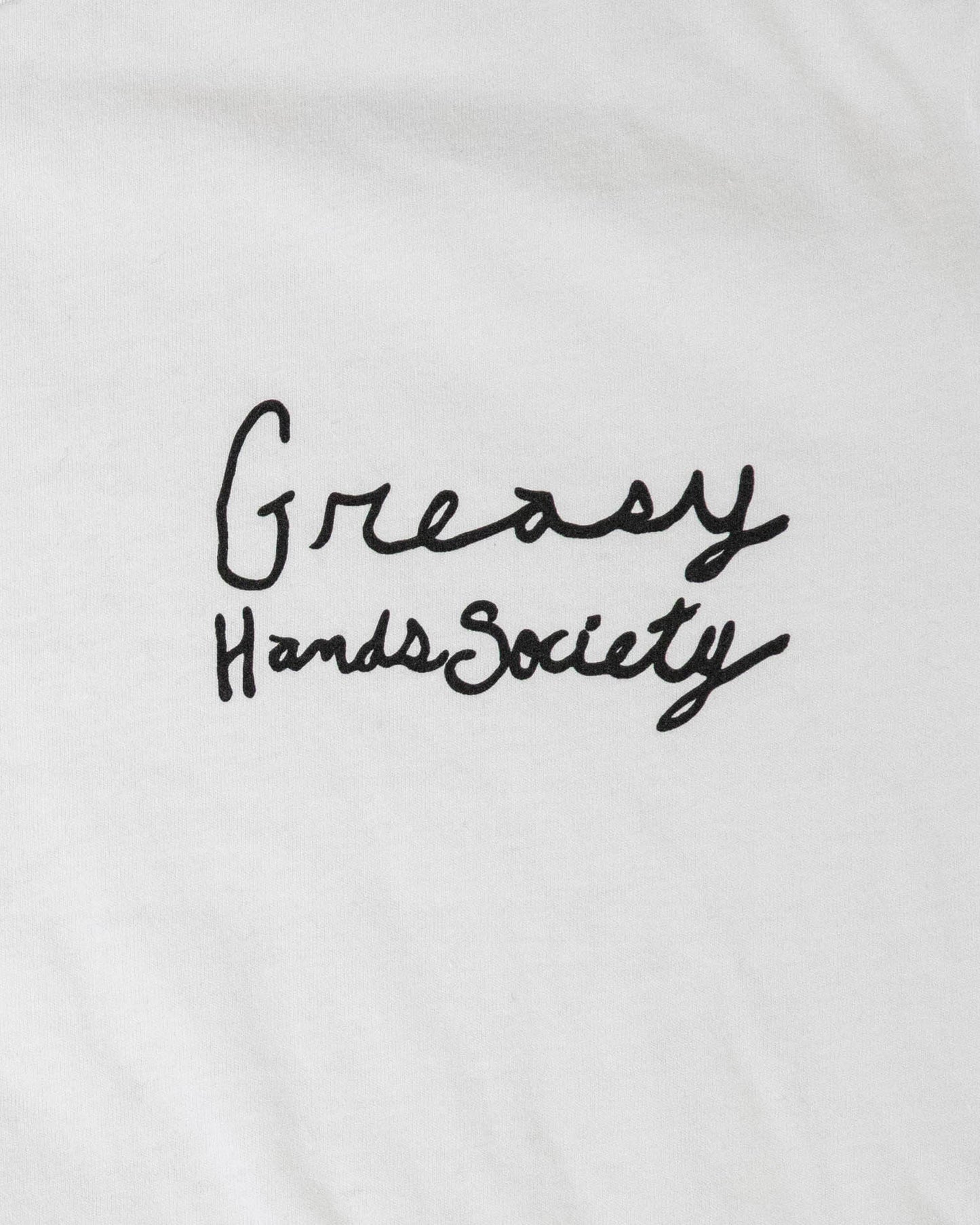 Text 'Greasy Hands Society' on the front left chest of a white graphic tee background