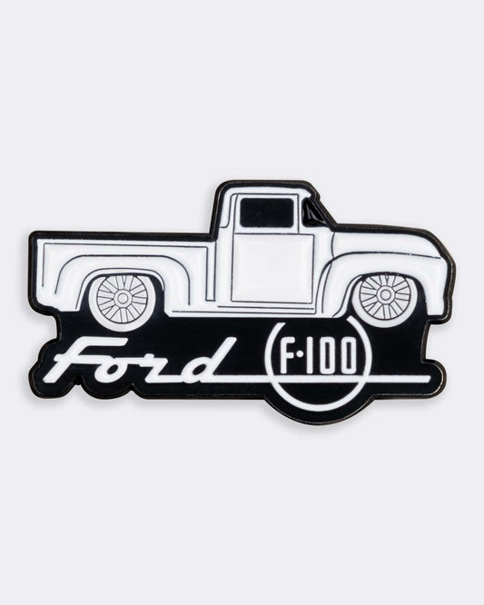 ford f-100 truck enamel pin in black and white on a gray background