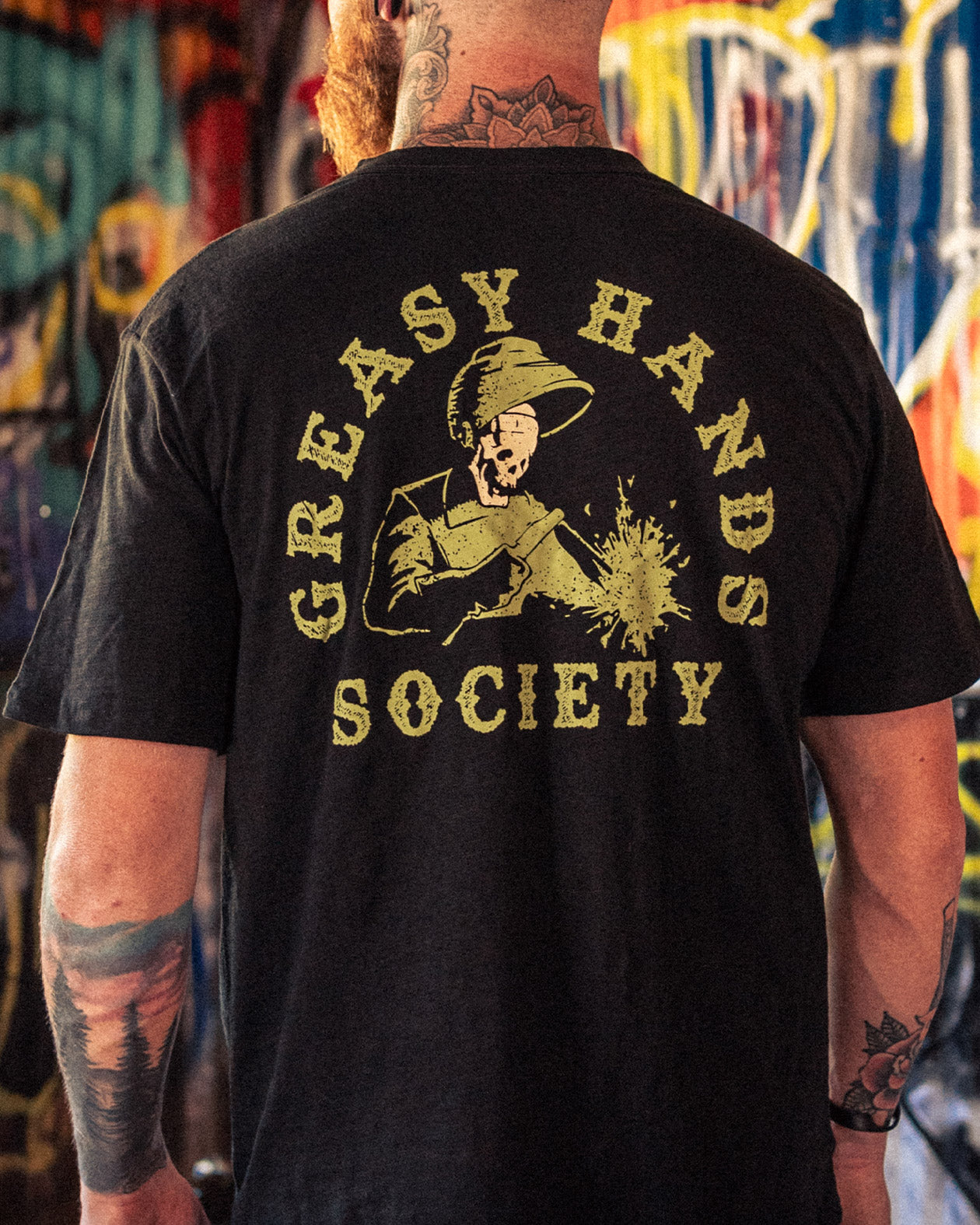 Weld On black graphic tee shirt showing a welder in green full back graphic - welders t-shirt from greasy hands society