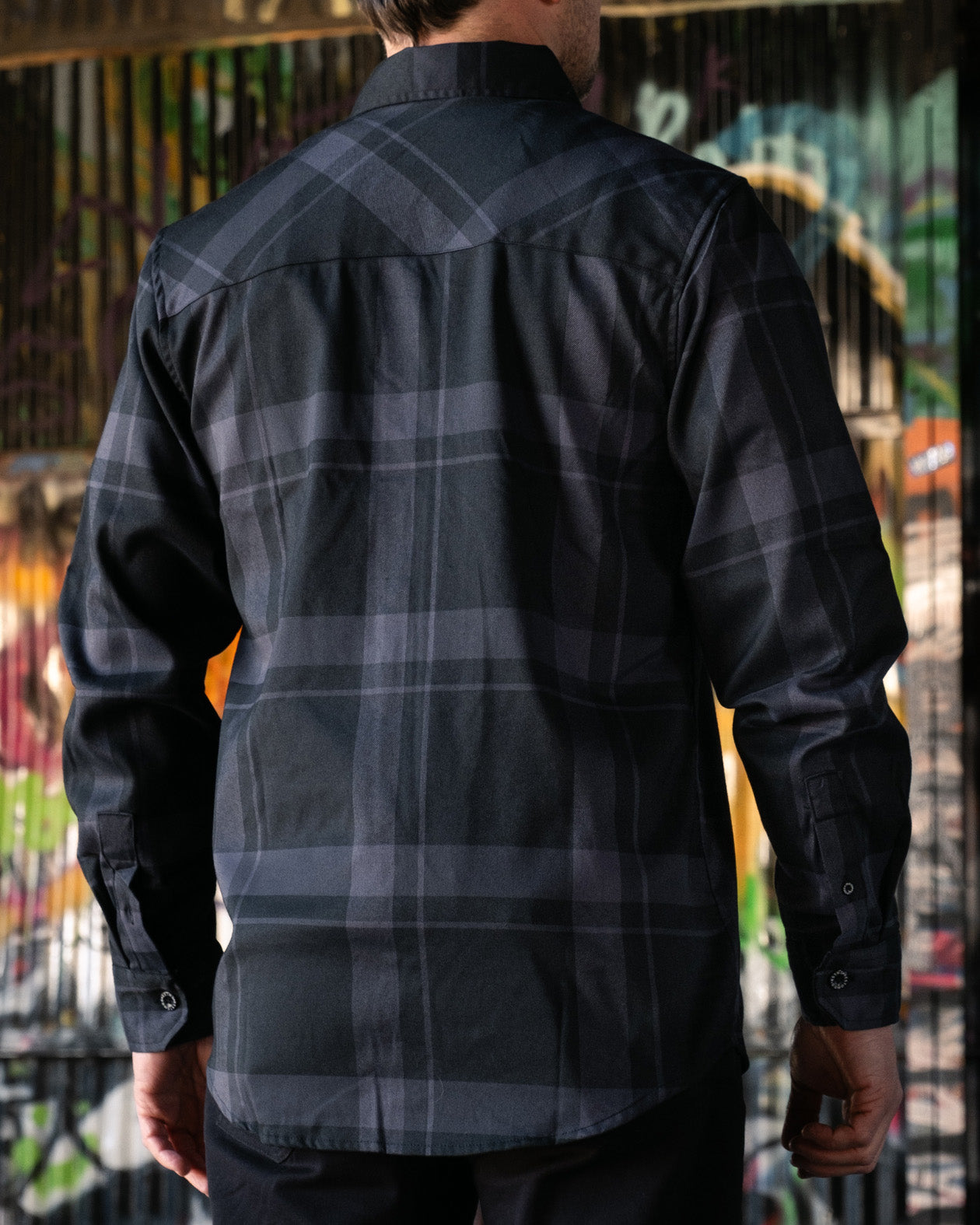 the synister continental flannel back view shoing off the black flannel pattern
