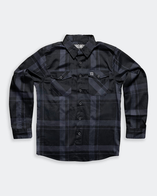 synister black plaid pattern flannel flat lay