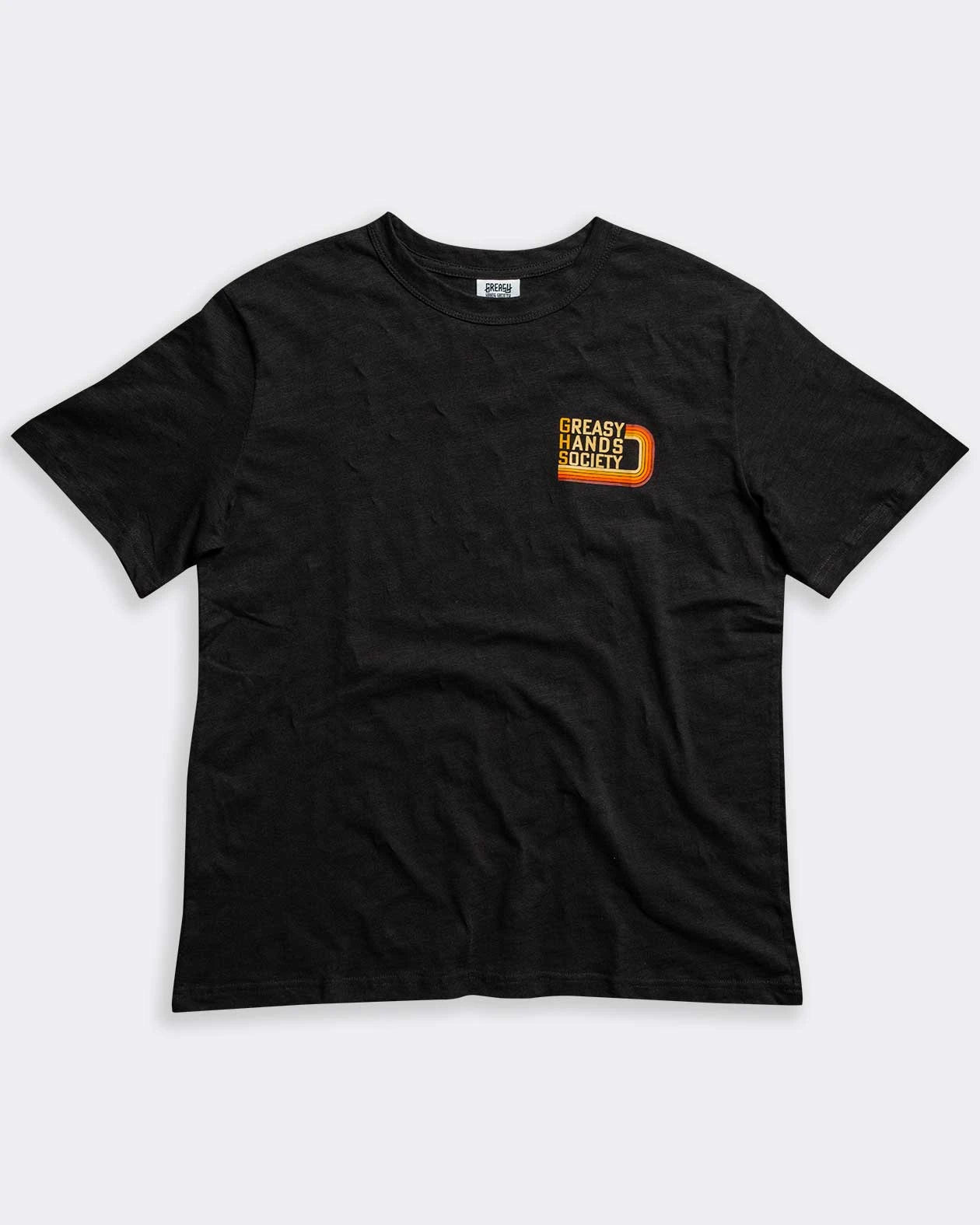 g70 black graphic tee with a left chest graphic of "Greasy Hands Society" in a 70's style