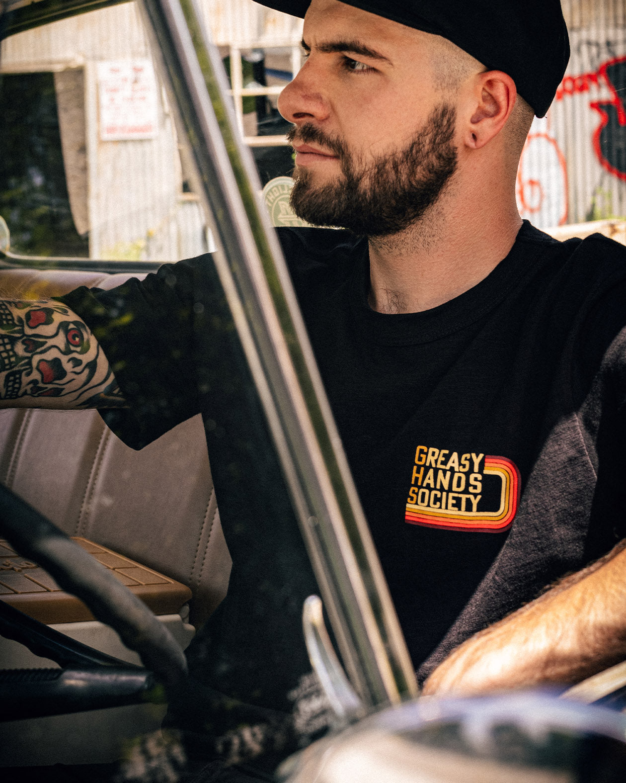 G70 - black graphic t-shirt with a 70's style graphic on the front and back