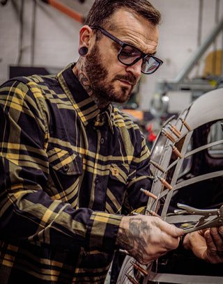 two lane black and gold flannel on a model