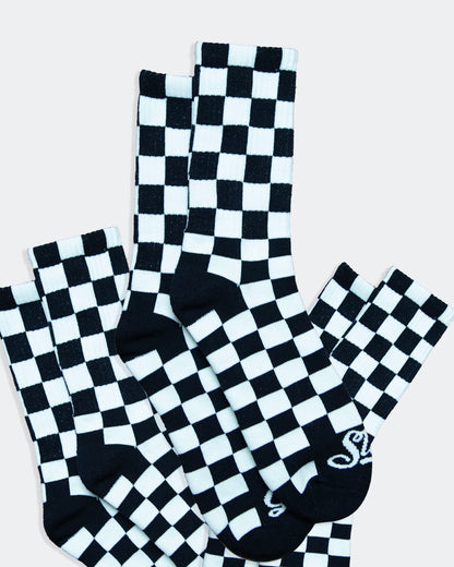 3-pack of black and white checkered crew socks from greasy hands society