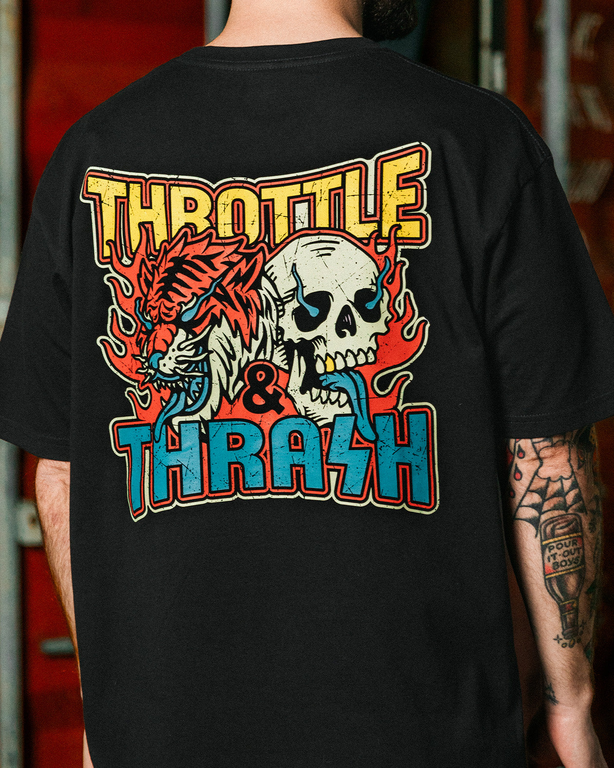 throttle and thrash black graphic tee full art back view on a model showing a tiger and skull