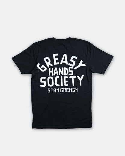 Black t-shirt with 'Greasy Hands Society Stay Greasy' text on a white background - factory sealed men's graphic tee
