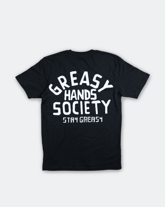 Black t-shirt with 'Greasy Hands Society Stay Greasy' text on a white background - factory sealed men's graphic tee