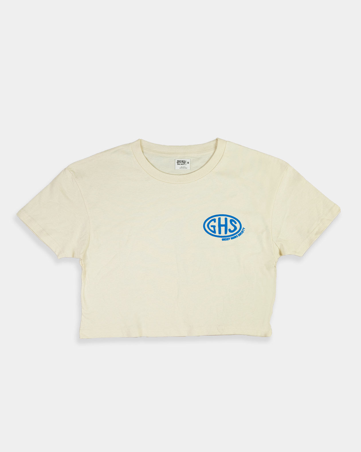 Beige crop top t-shirt with a blue logo on a white background -  Buckle Up Crop Top by Greasy Hands Society