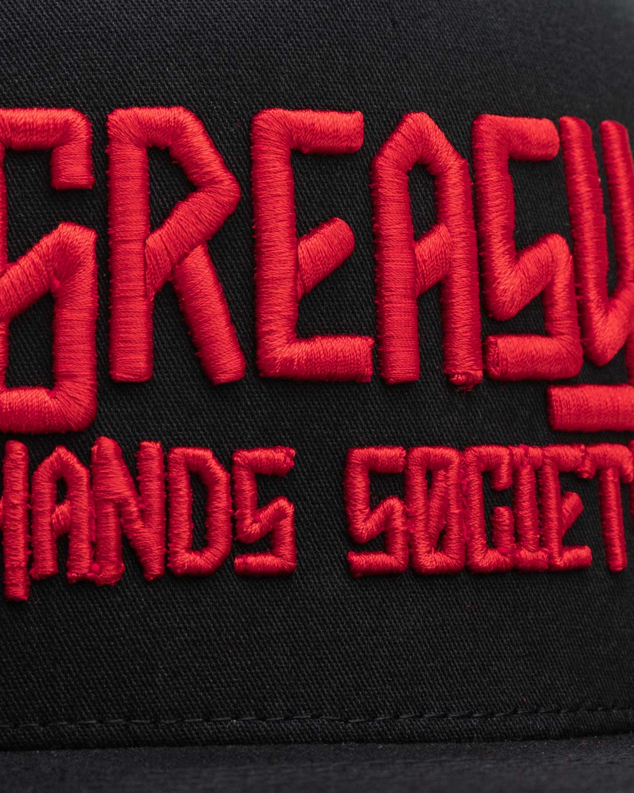 greasy hands society red logo detail