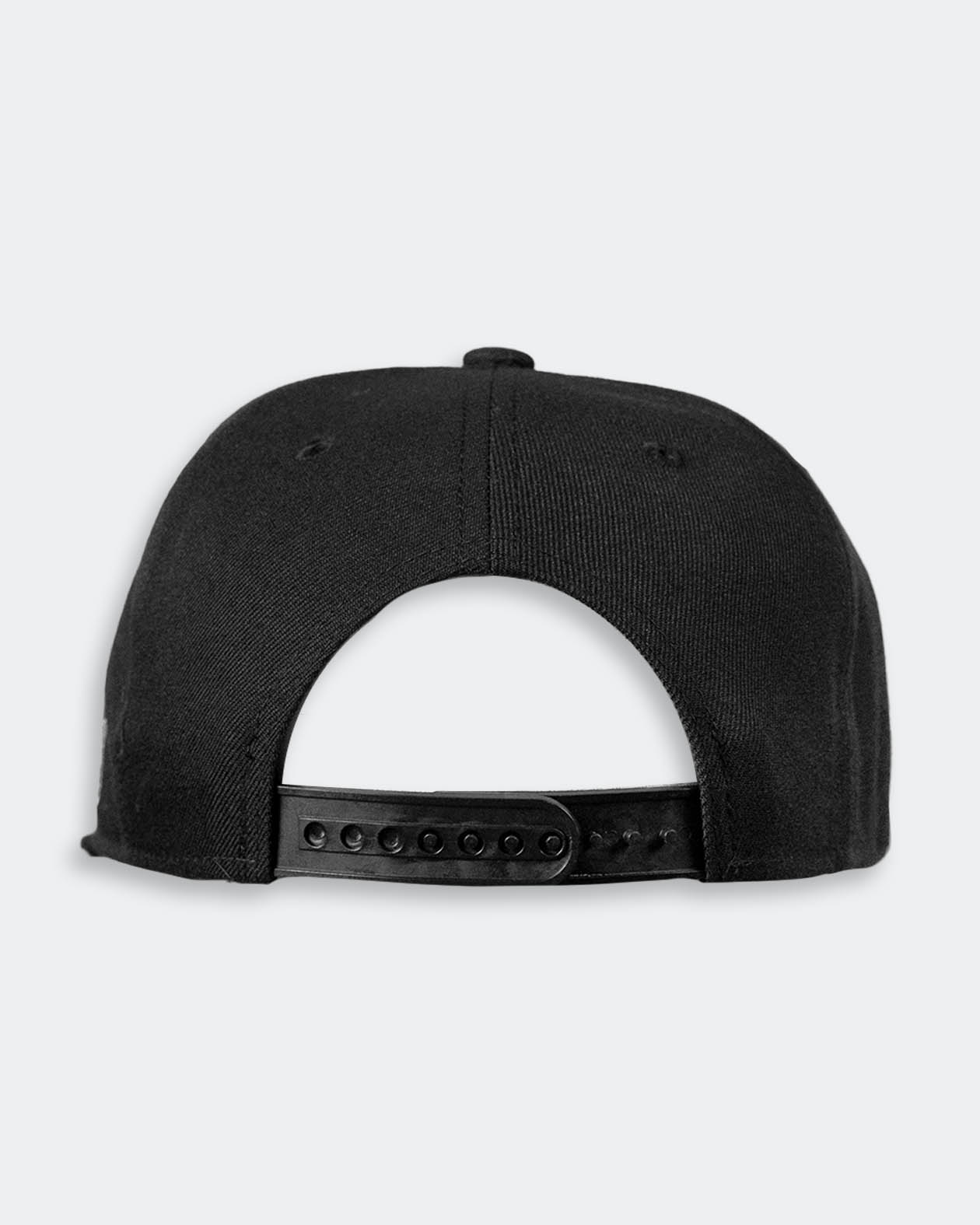 black of a Black snapback cap on a light gray background