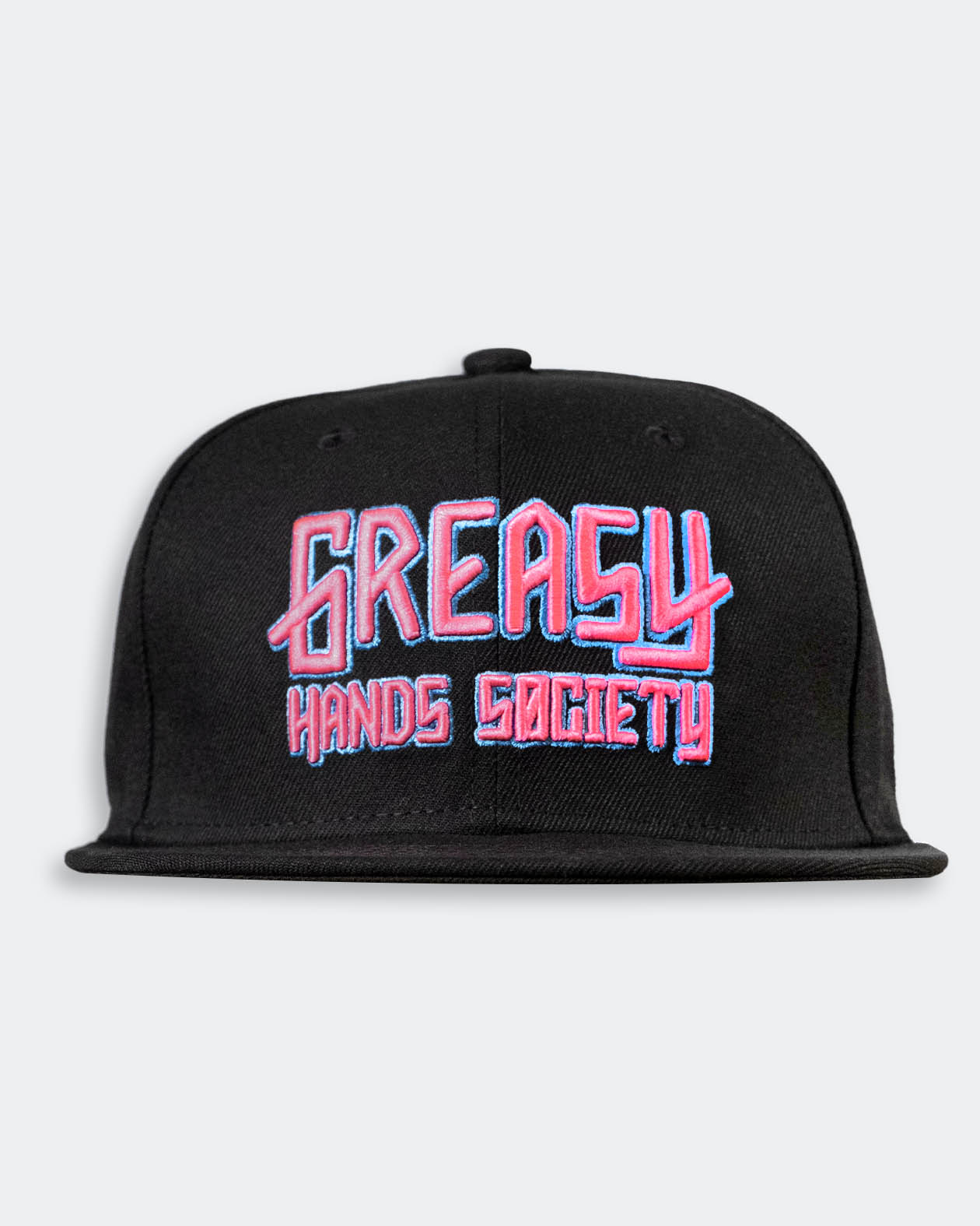 Black cap with pink and blue 'Greasy Hands Society' logo on a light gray background
