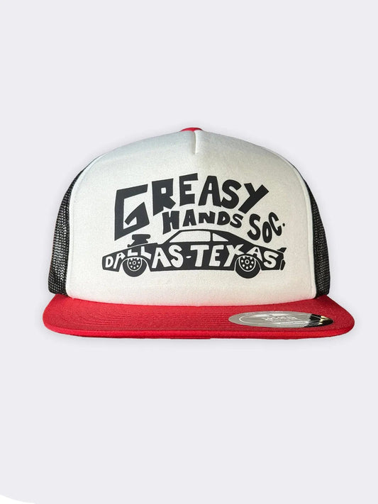 A red and white trucker hat with black mesh back panels and a black graphic on the front that reads 'GREASY HANDS SOC. DALLAS TEXAS' with a car illustration - Dallas Dragster Red/White/Black Hat by Greasy Hands Society