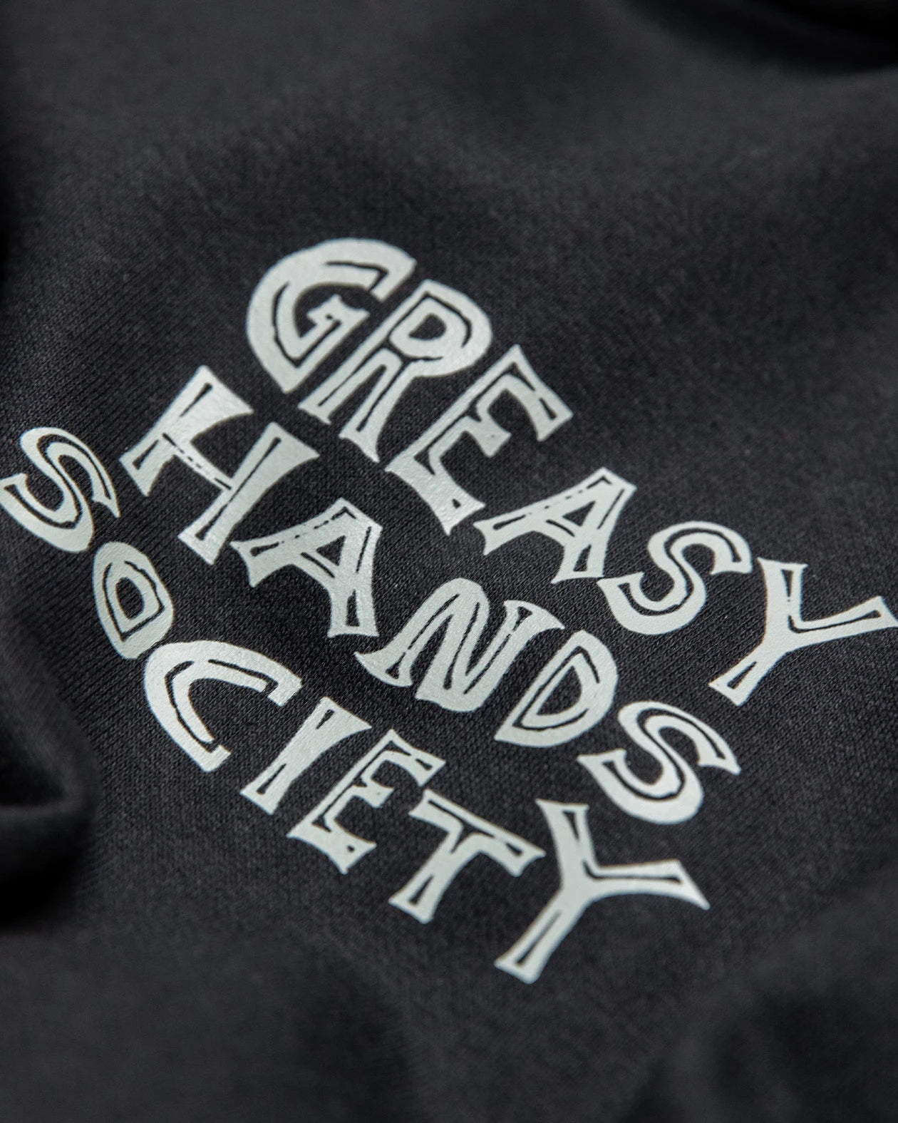 Live Fast Stay Greasy Hoodie front left chest design detail