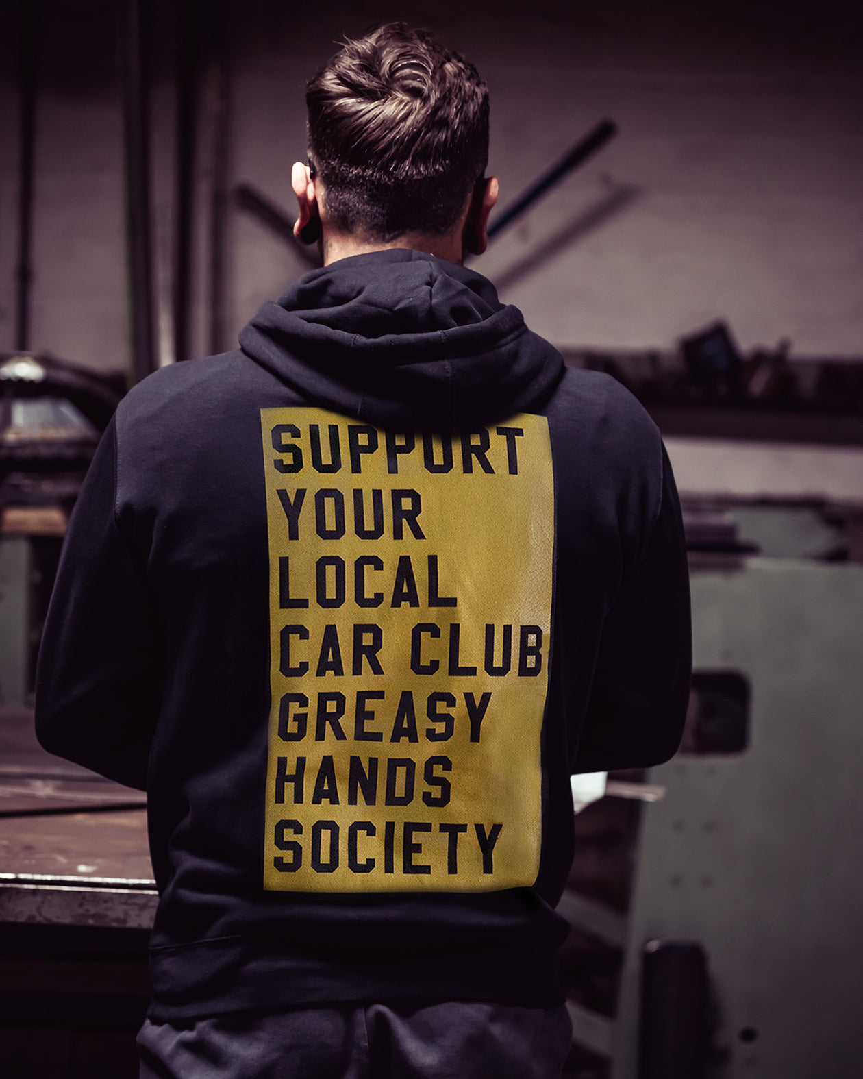 support your local car club black heavyweight hoodie with full back rectangle graphic on a model