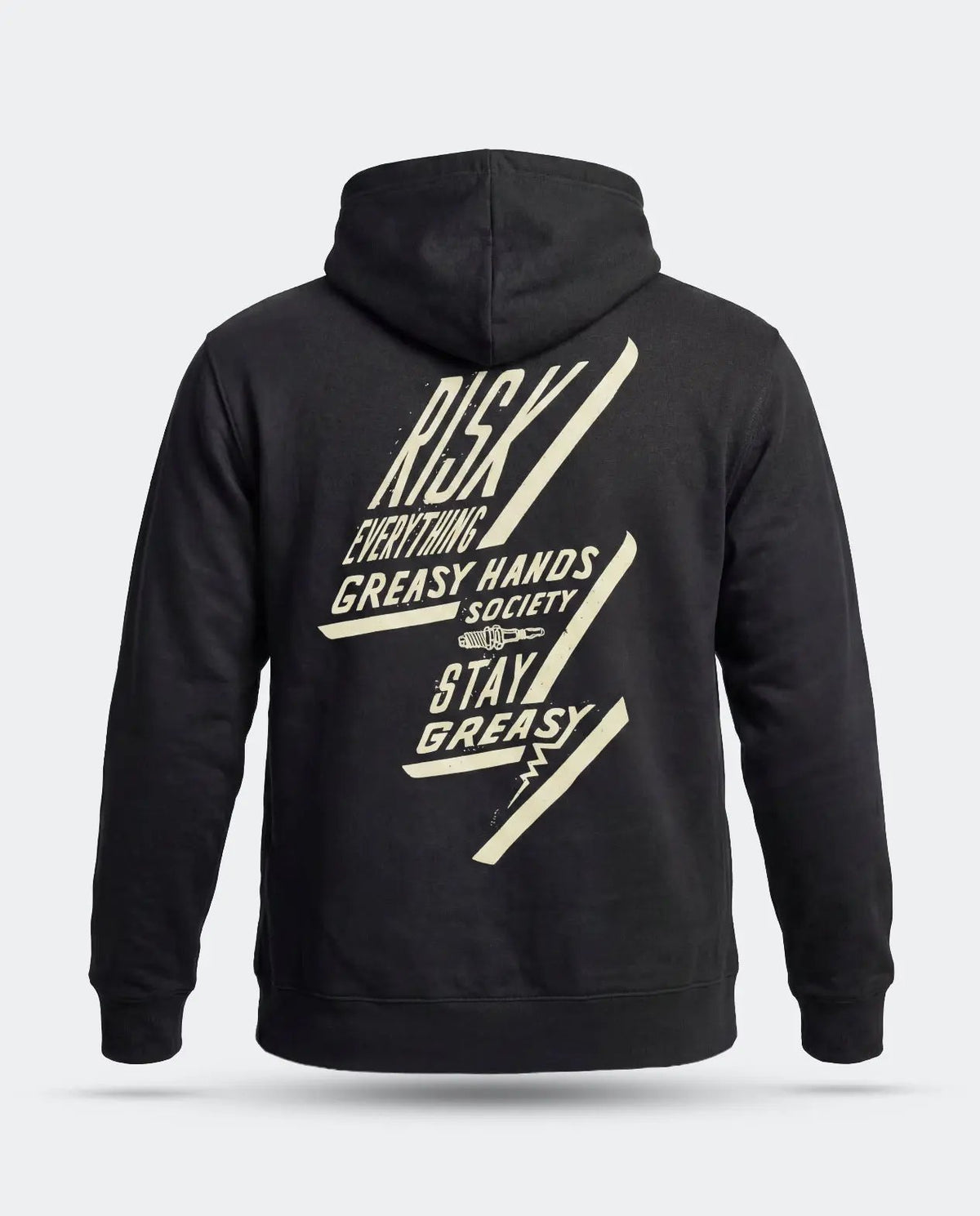 A black pullover hoodie shown from the back, featuring a large cream-colored graphic print with the text 'RISK EVERYTHING - GREASY HANDS SOCIETY - STAY GREASY' and diagonal lightning-bolt shapes, on a light gray background - Bolted Down Black Hoodie by Greasy Hands Society