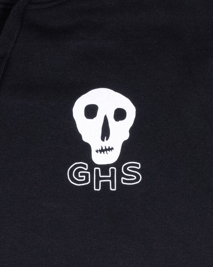 women's black hoodie with a white skull and 'GHS' logo on a dark background