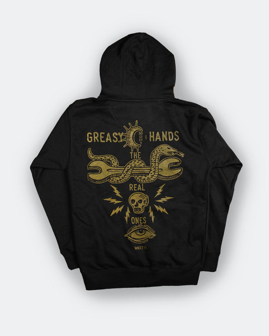 Black hoodie by greasy hands society called the snake eyes hoodie with gold snake and wrench graphic design on a white background