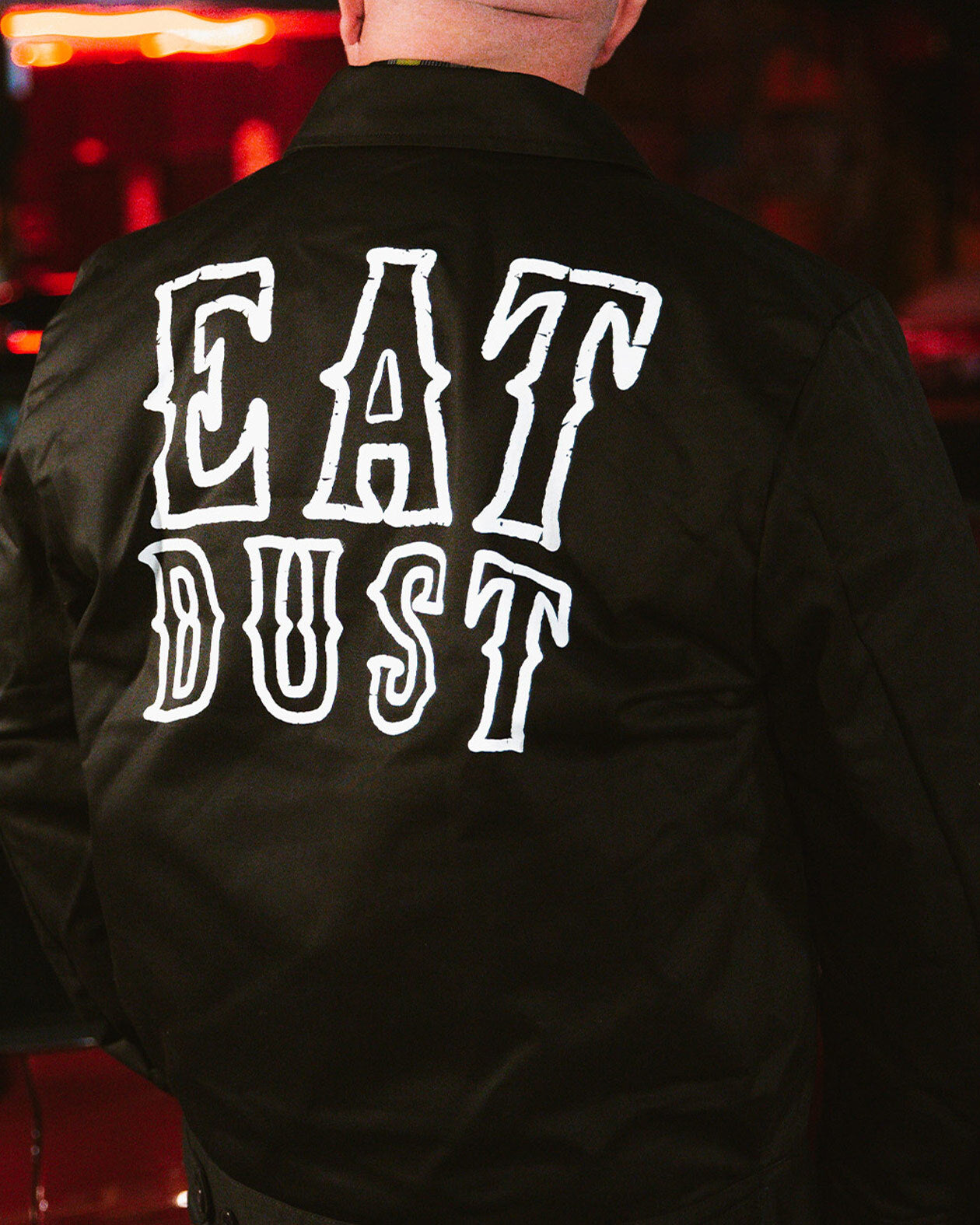 Eat Dust black Mechanic Jacket full back graphic on a model