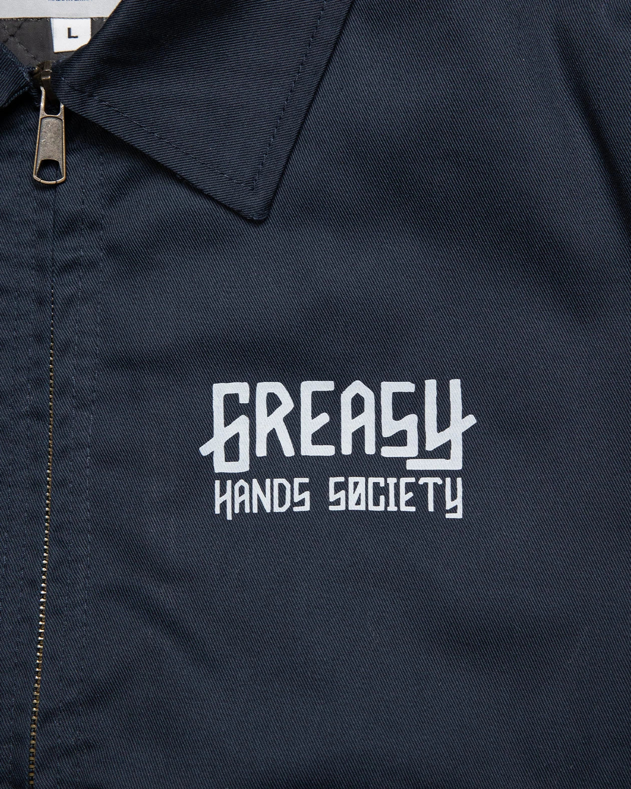 GHS Logo Blue Mechanic Jacket front left chest logo in white