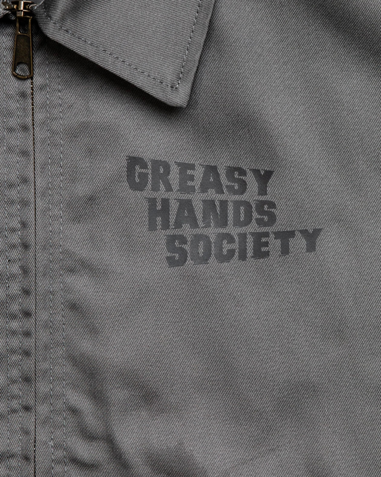 Sparks Flyin Mechanic Jacket front left chest greasy hands society graphic