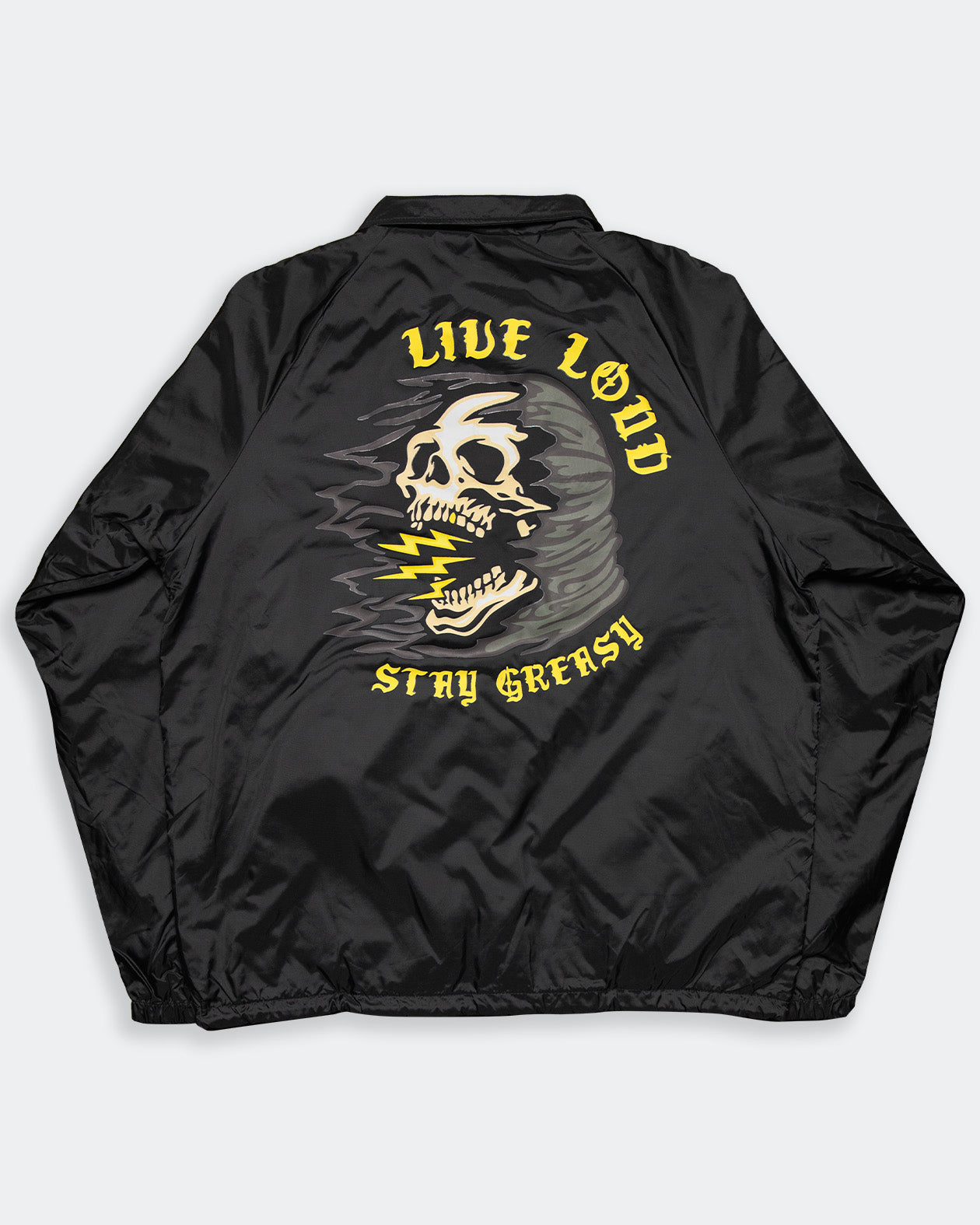 live loud back flat lay showing a skull with lightning