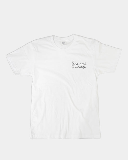 White t-shirt with greasy hands society on the front left chest on a gray background