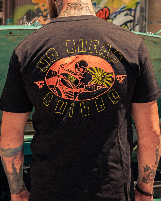 no cheap builds black tee with full back graphic of a motorcycle rider on a model