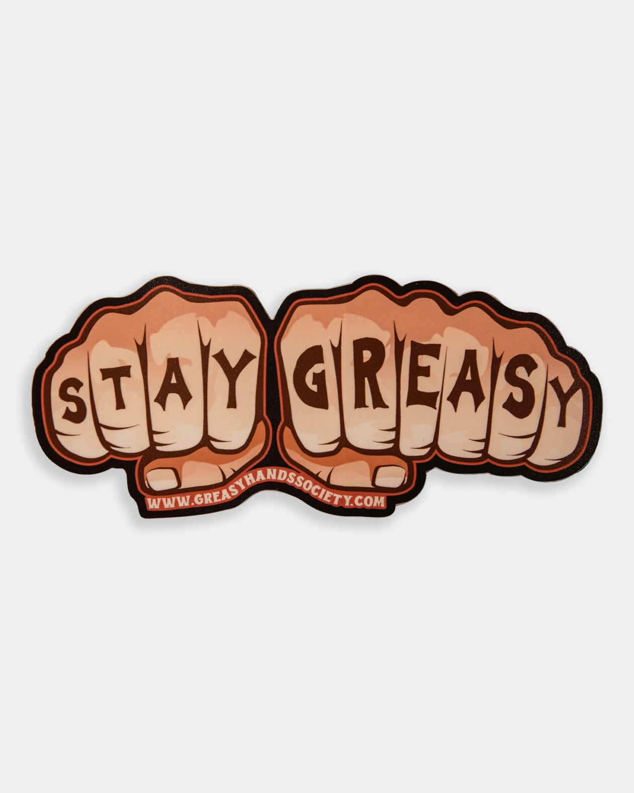 Knuckles Sticker orange sticker with tattooed knuckles showing stay greasy flat lay on gray