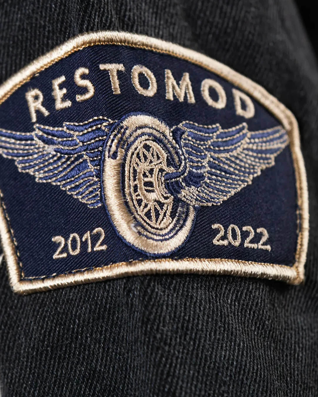 restomod patch detail on black denim jacket from greasy hands society