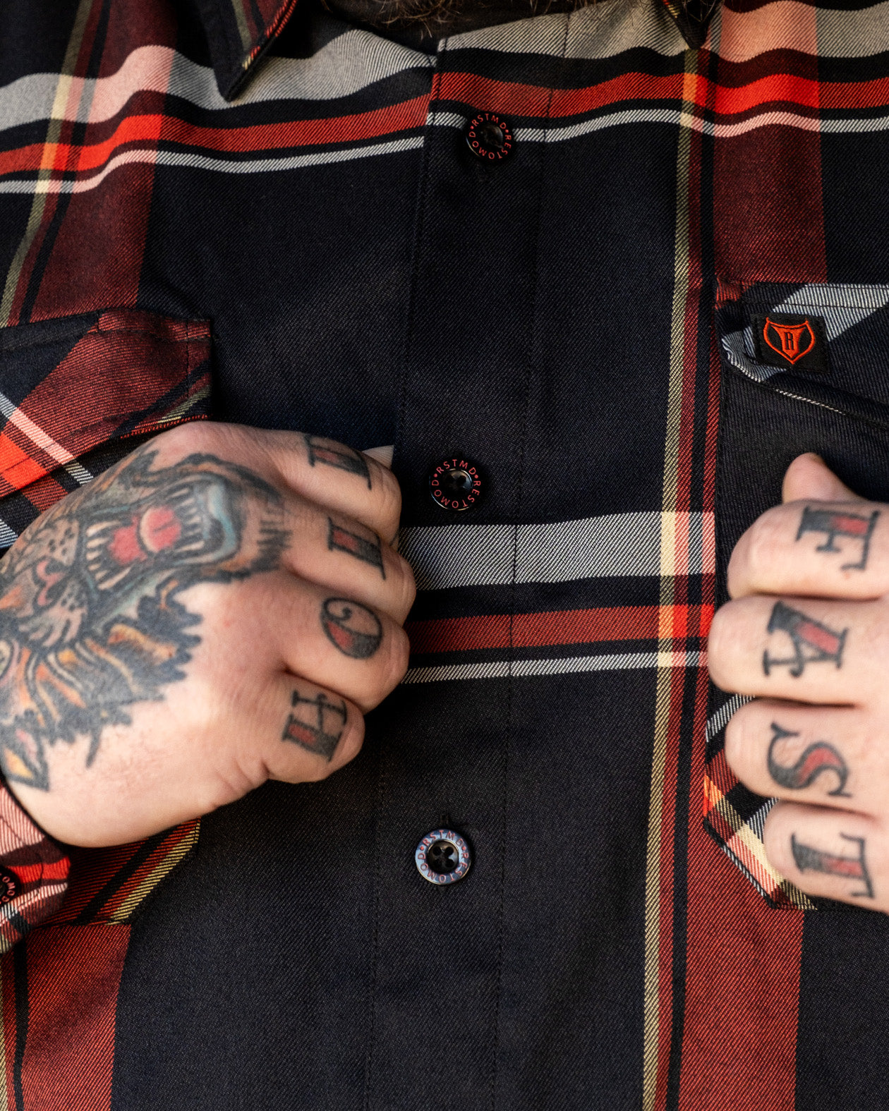 The Devil in the Details Flannel red black and white flannel front detail of buttons