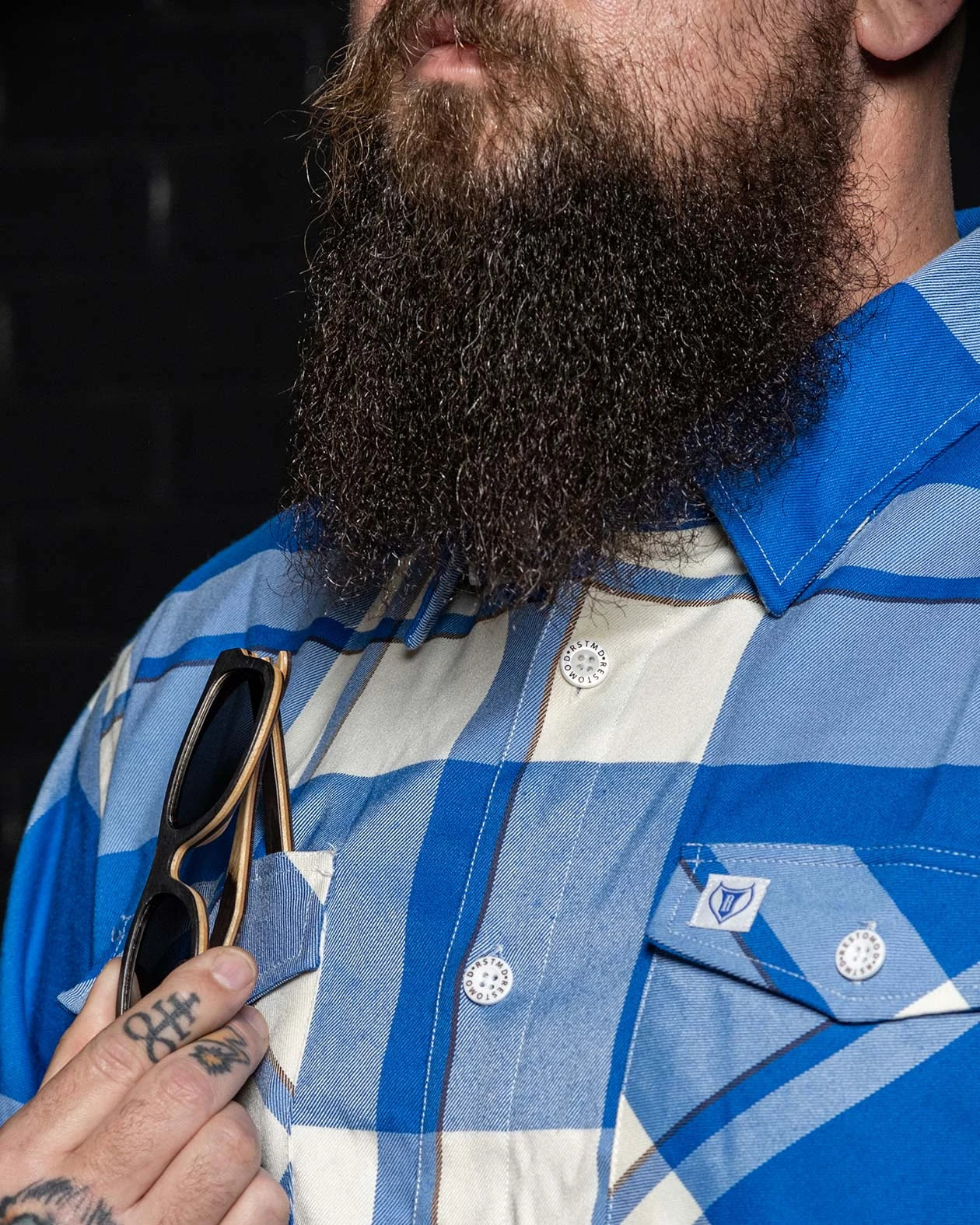 blue and white plaid pattern showing front sunglasses pocket for f**kin problems flannel 
