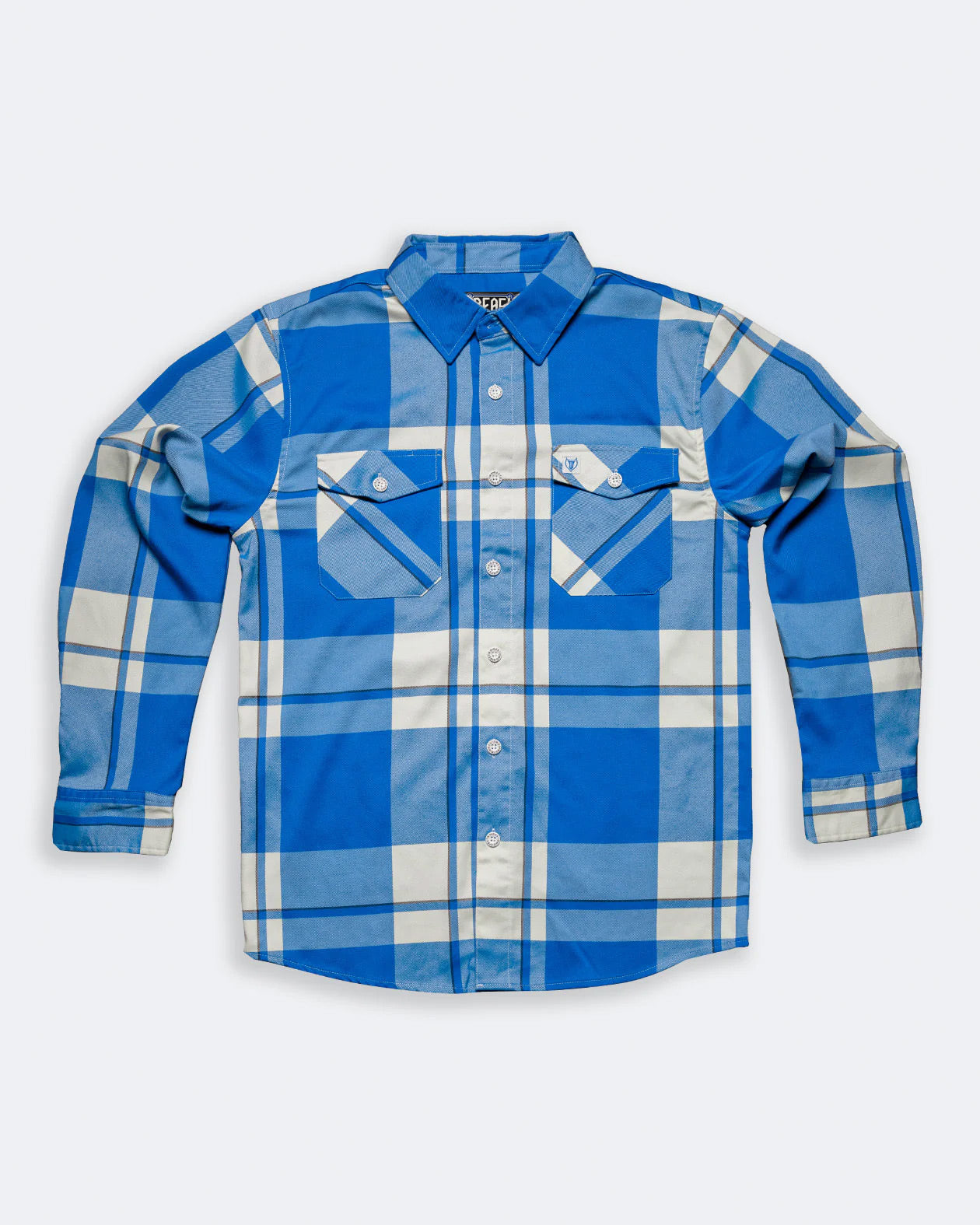 blue and white flannel by greasy hands society called f**kin problems - flat lay view on gray