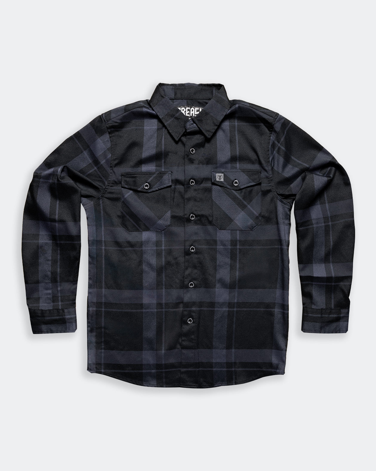 synister black plaid pattern flannel flat lay