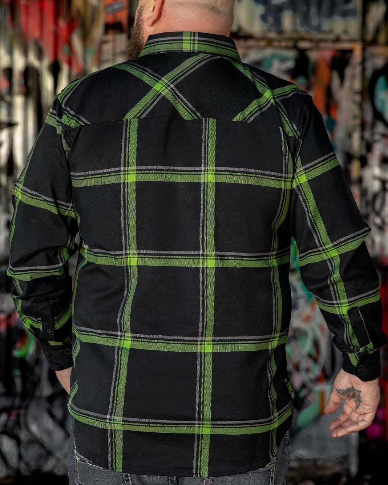 the moto flannel full back view of black and green flannel pattern