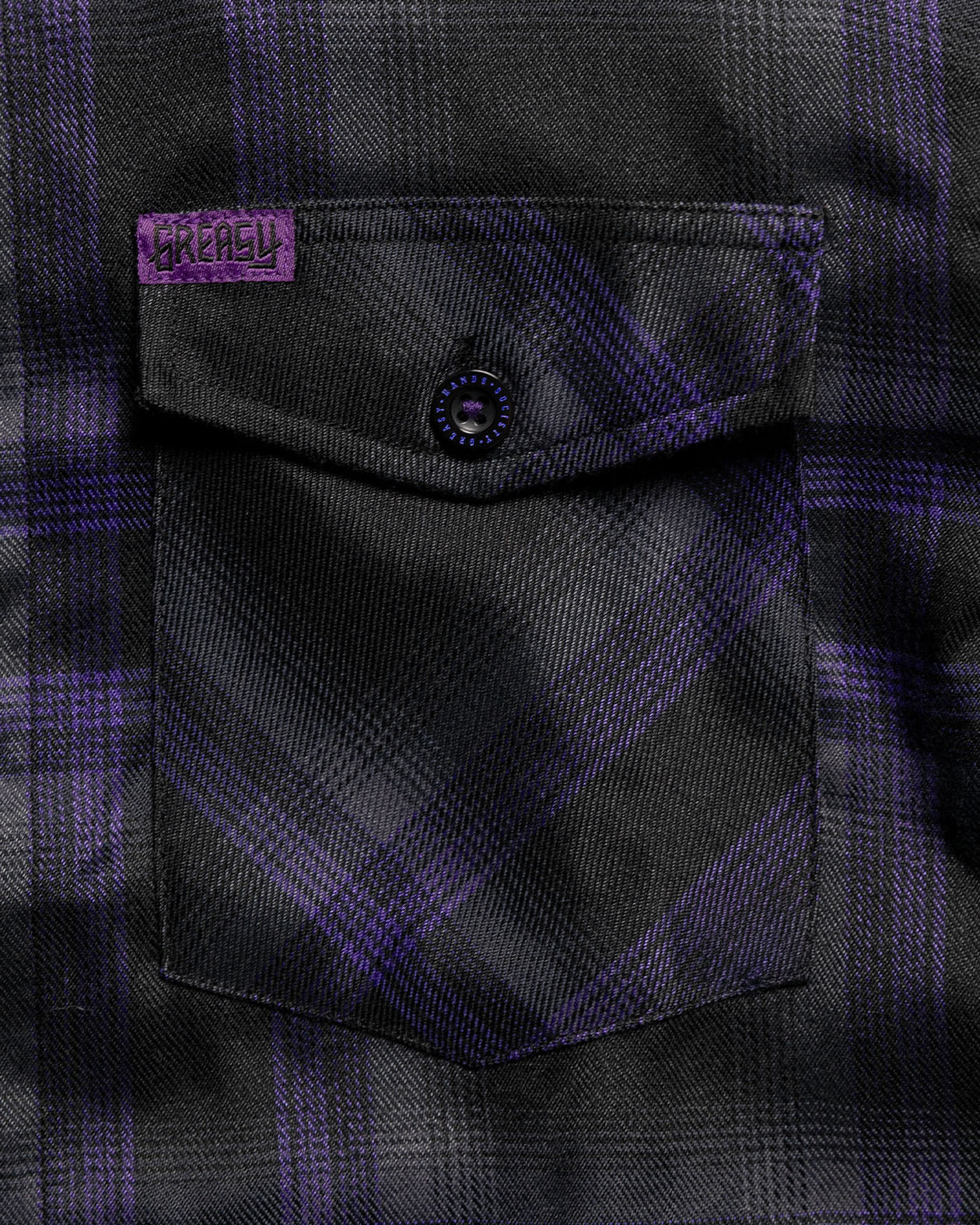 Kiss The Sky Flannel purple and black plaid pattern fron pocket detail