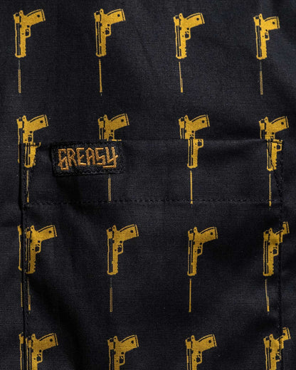 hitman pattern black background with golden gun motif