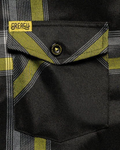 Eat Dust black, yellow and gray flannel front pocket detail