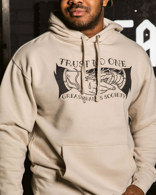 Trust No One Hoodie cream/beige hoodie with trust no one graphic on the front