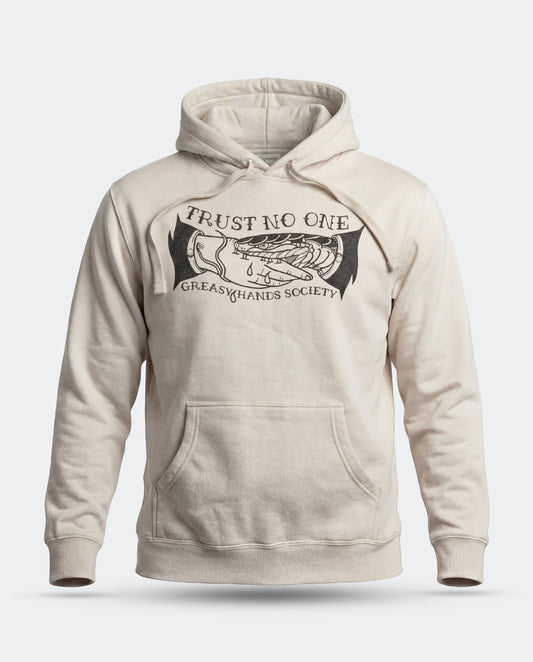 A cream-colored pullover hoodie with a black graphic print on the chest reading 'TRUST NO ONE' and 'GREASY HANDS SOCIETY' around an illustration of a hand holding a dripping scale, shown against a light gray background Trust no One Hoodie by Greasy Hands Society