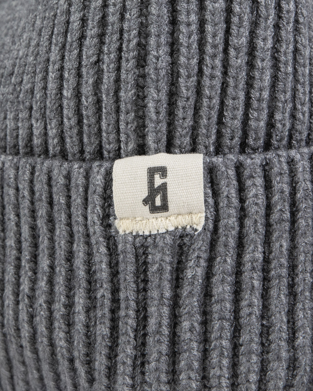 gray watch cap tag G Icon detail