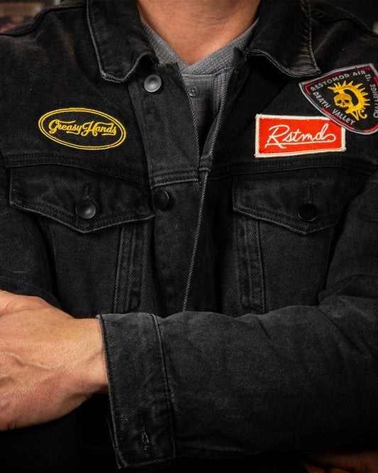 Greasy Hands Black Denim Jacket front view on a model